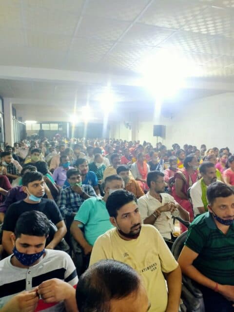 A person signing a document.