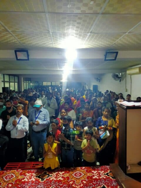 A diverse group of people in a meeting.