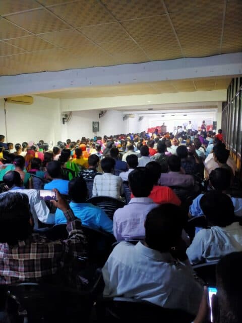 People networking at a corporate event.
