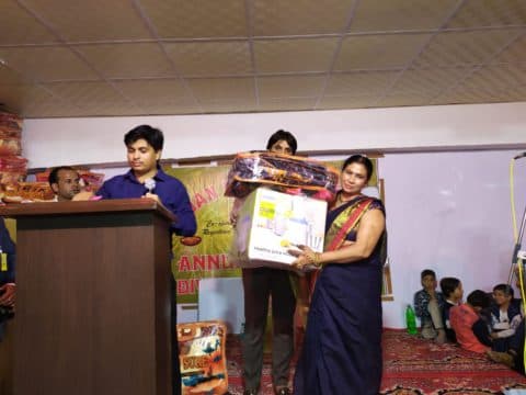 A person reviewing loan documents at a desk.